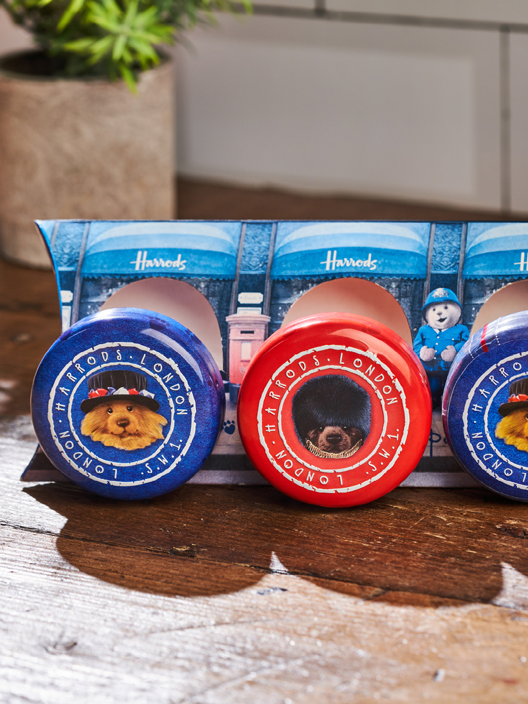 Custom selection box tin packaging designed with images of different animal characters. 