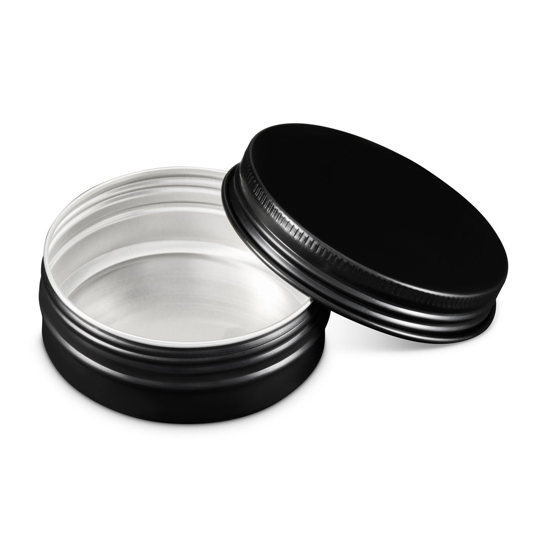 A black tin with lid open showing the internal EPE liner in the lid section and silver interior.